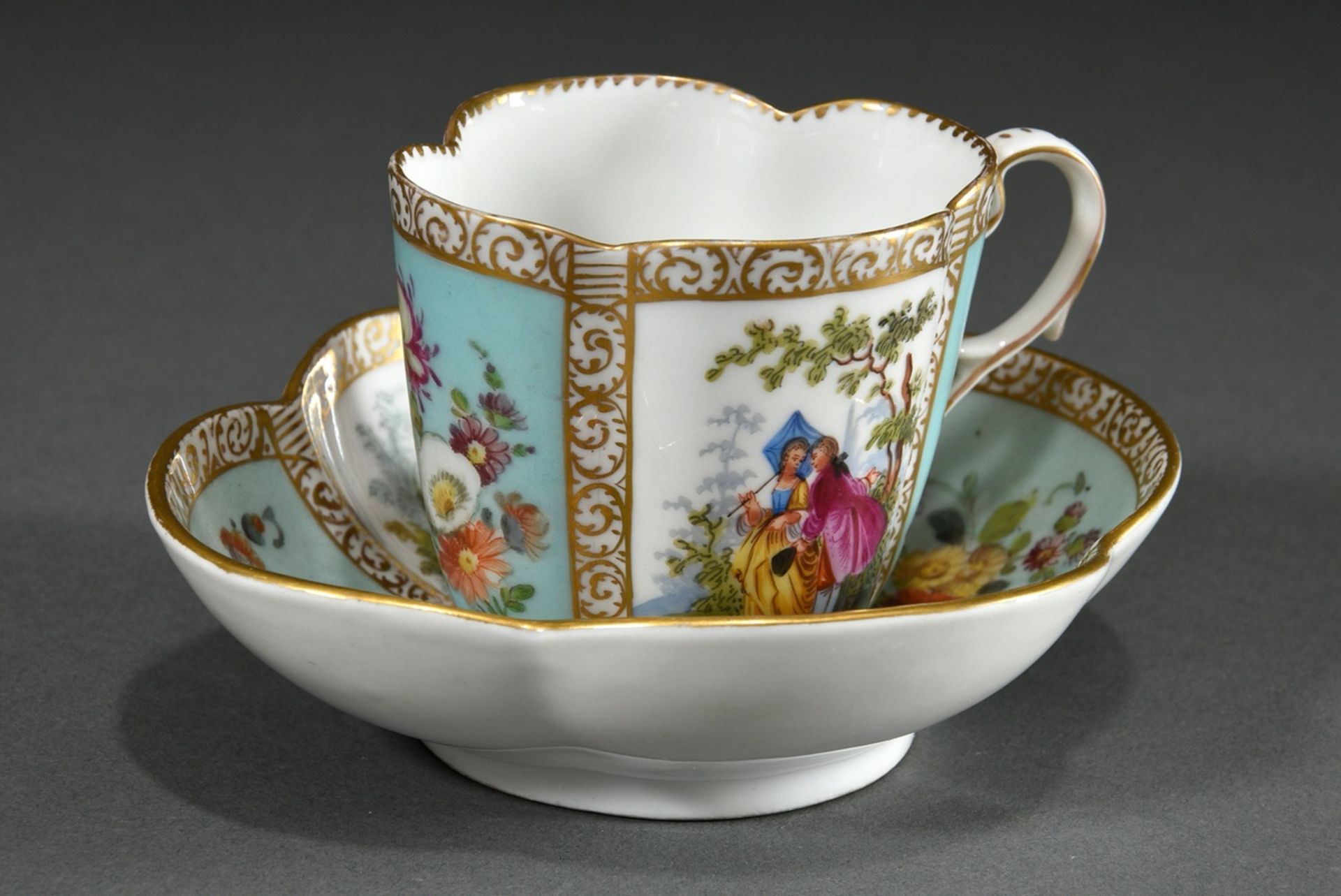 A four-piece porcelain cup/saucer with polychrome painting "Lovers" and "Blossoms" on a turquoise b - Image 2 of 8