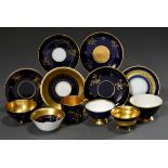 6 Diverse Mokkatassen/UT mit unterschiedlichen floralen und ornamentalen Golddekoren auf kobaltblau
