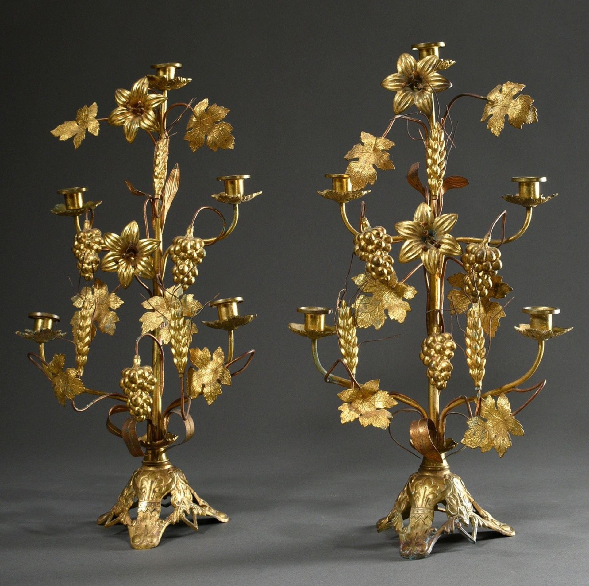 Pair of Marian or altar candlesticks with sculptural lily blossoms, grapes and ears of grain on orn