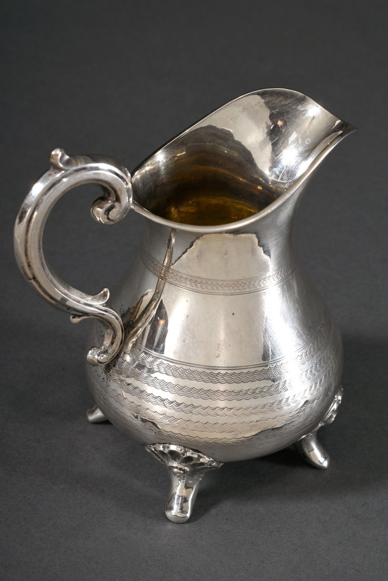 Cream jug on four shell feet with guilloché frieze, ligatured monogram engraving "CM" and curved ha - Image 2 of 5