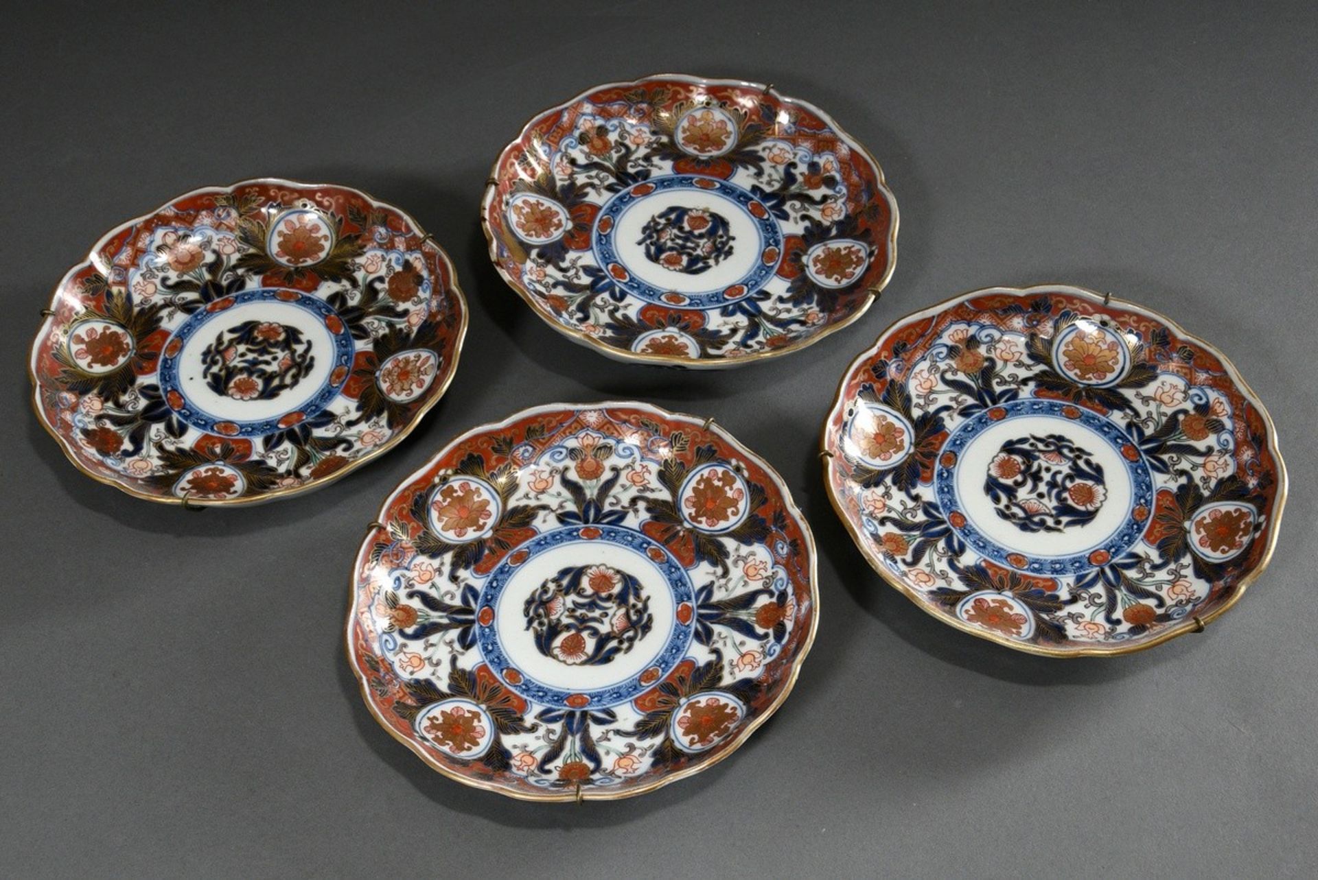 7 Various Japanese porcelains with Imari décor in underglaze blue, iron red and gold: 3 various sak - Image 6 of 8