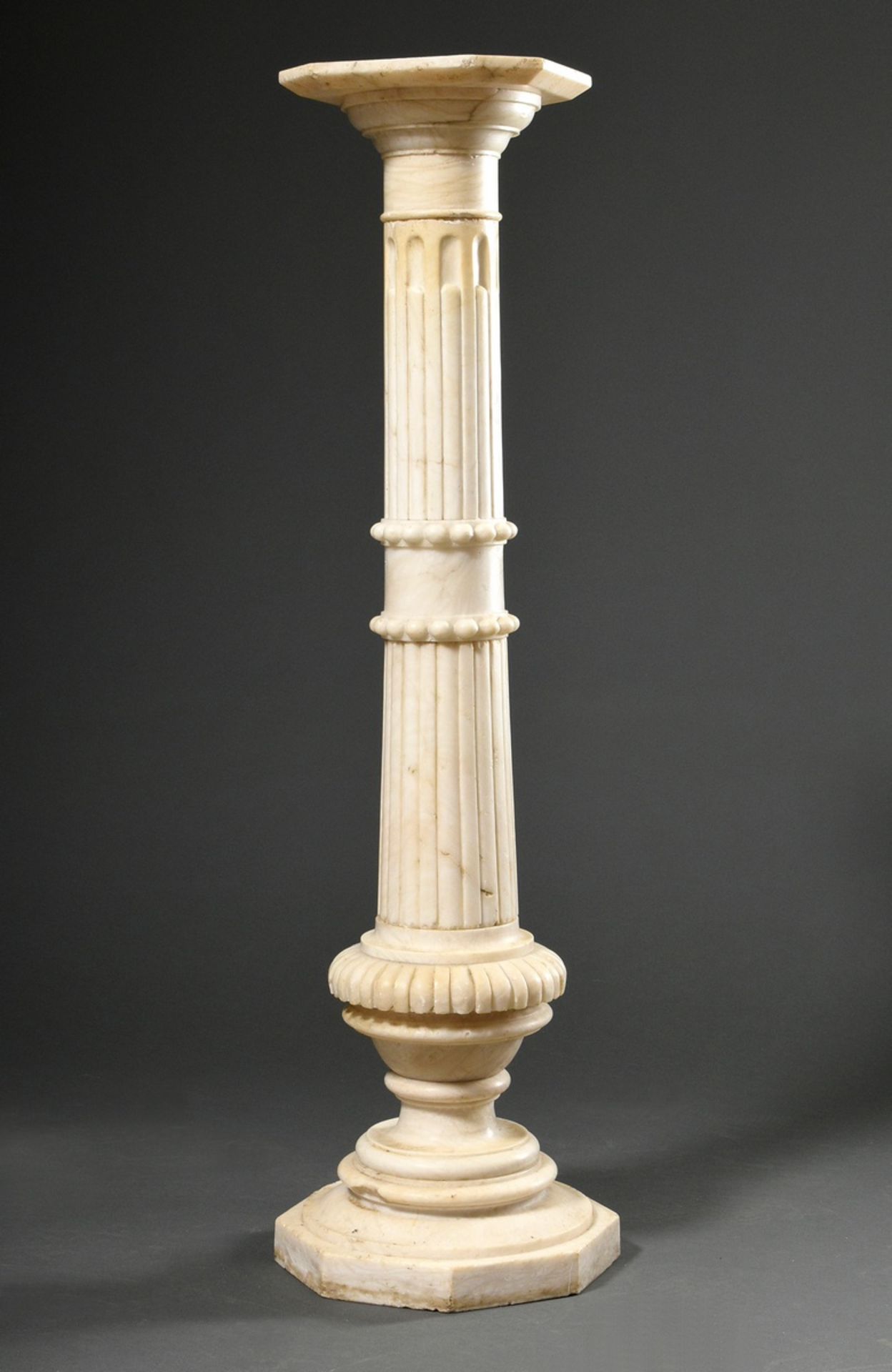 White marble column with fluted shaft and surrounding pearl friezes on an octagonal base, c. 1890, 