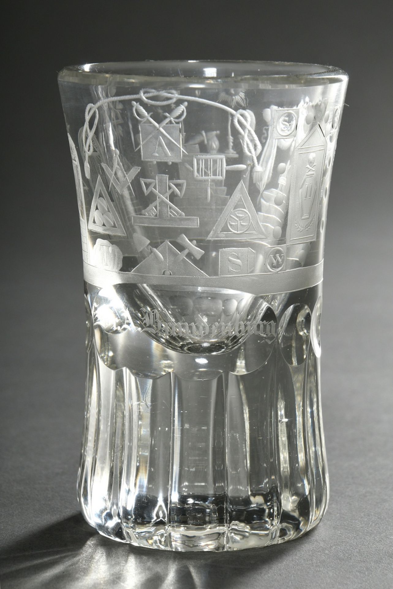 Thick-walled masonic glass with dedication inscription and rich symbol cut, lower wall with concave