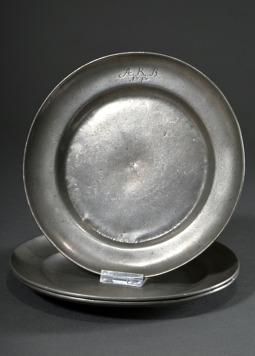 3 Various small pewter plates with engraved date "1747" and different monograms "C.F.R"/"A.R.B" and