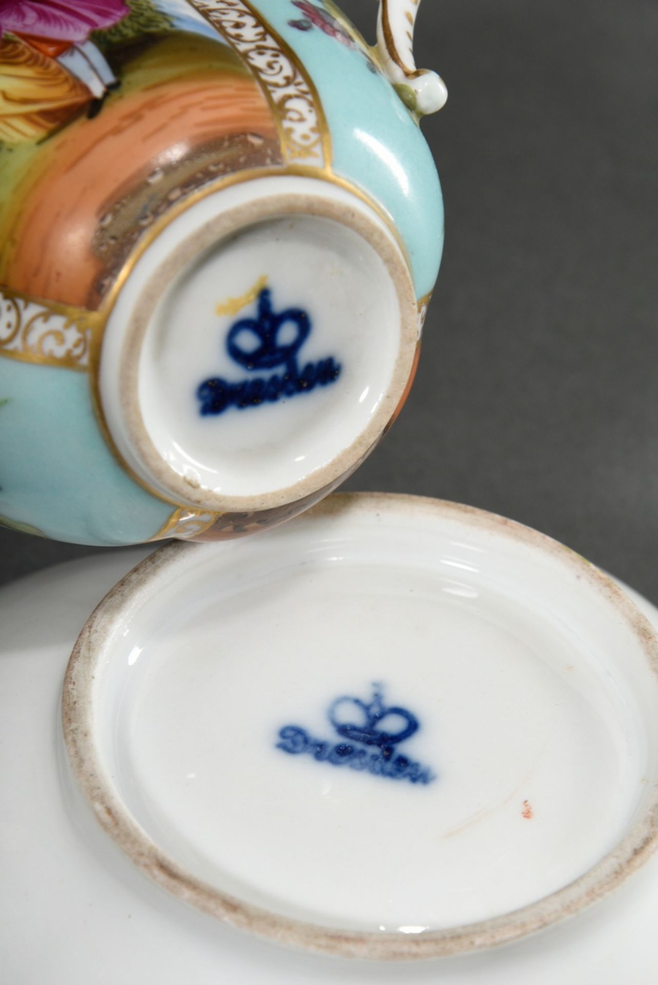 A four-piece porcelain cup/saucer with polychrome painting "Lovers" and "Blossoms" on a turquoise b - Image 8 of 8