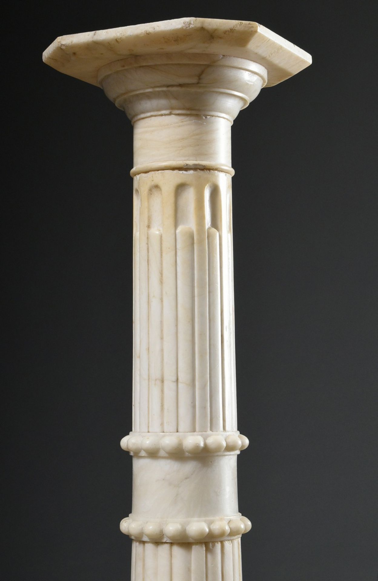 White marble column with fluted shaft and surrounding pearl friezes on an octagonal base, c. 1890,  - Image 3 of 4