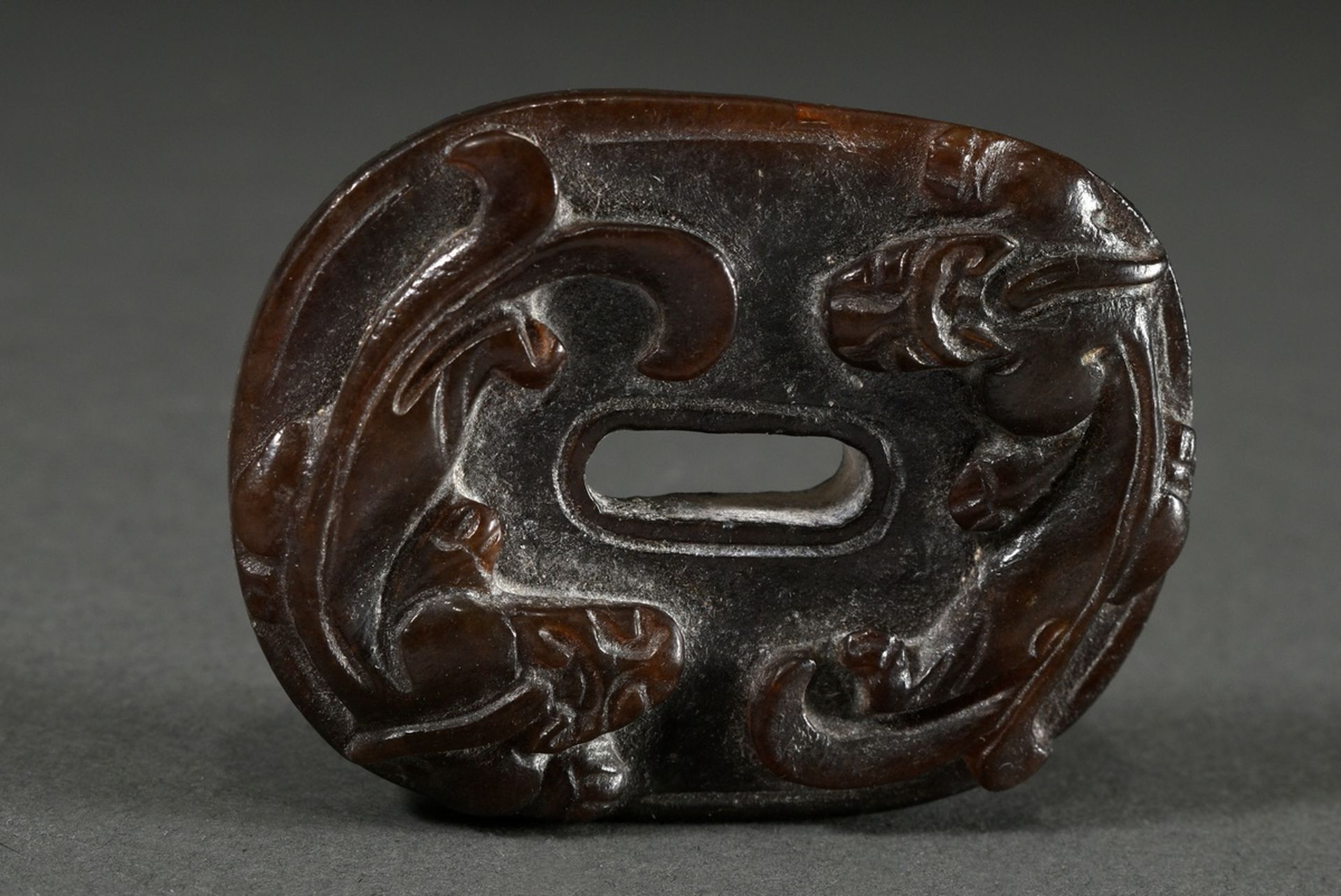 Oval dark brown jade in the shape of a Han period sword engraving with rain dragons and C ornaments - Image 3 of 3