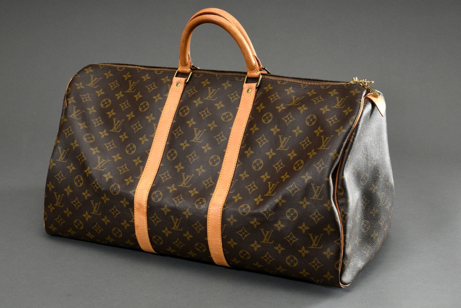 Louis Vuitton vintage "Keepall 55" in monogram canvas with brown textile lining, light cowhide leat