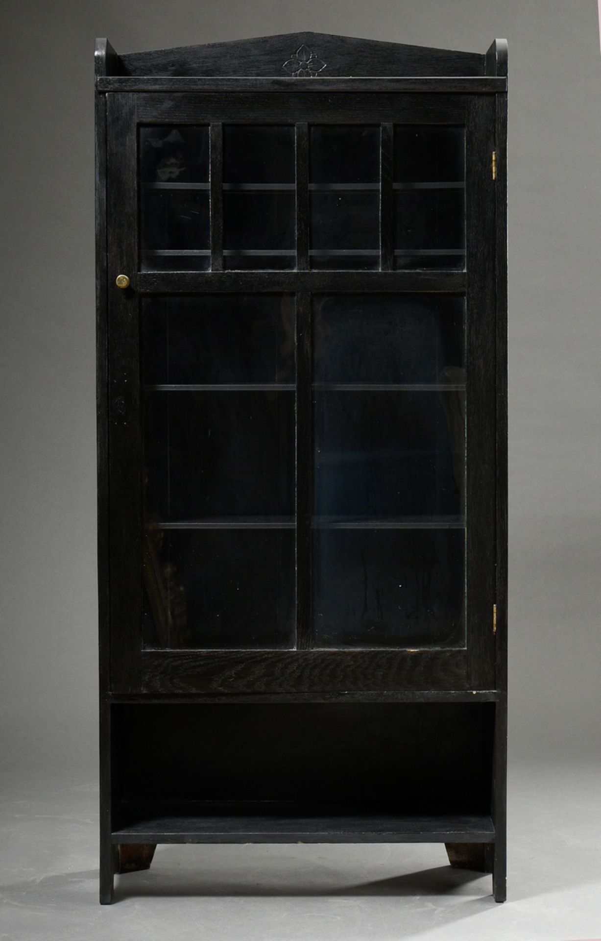 Art Nouveau glass cabinet in simple style with sparse flower decoration above glazed door, oak blac