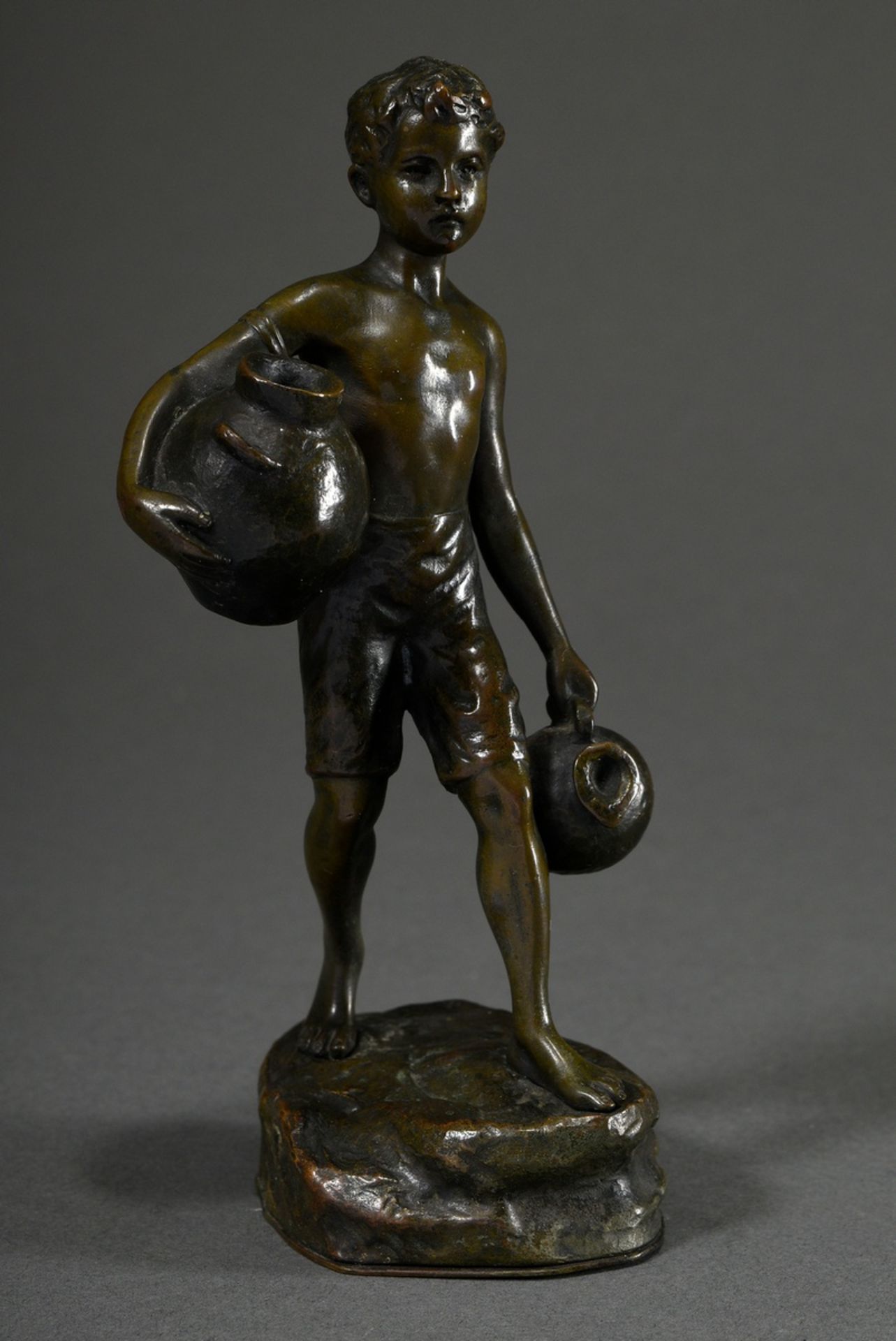Besserdich, Ruffino (1852-1915) "Water carrier", on a naturalistic plinth, patinated bronze, signed