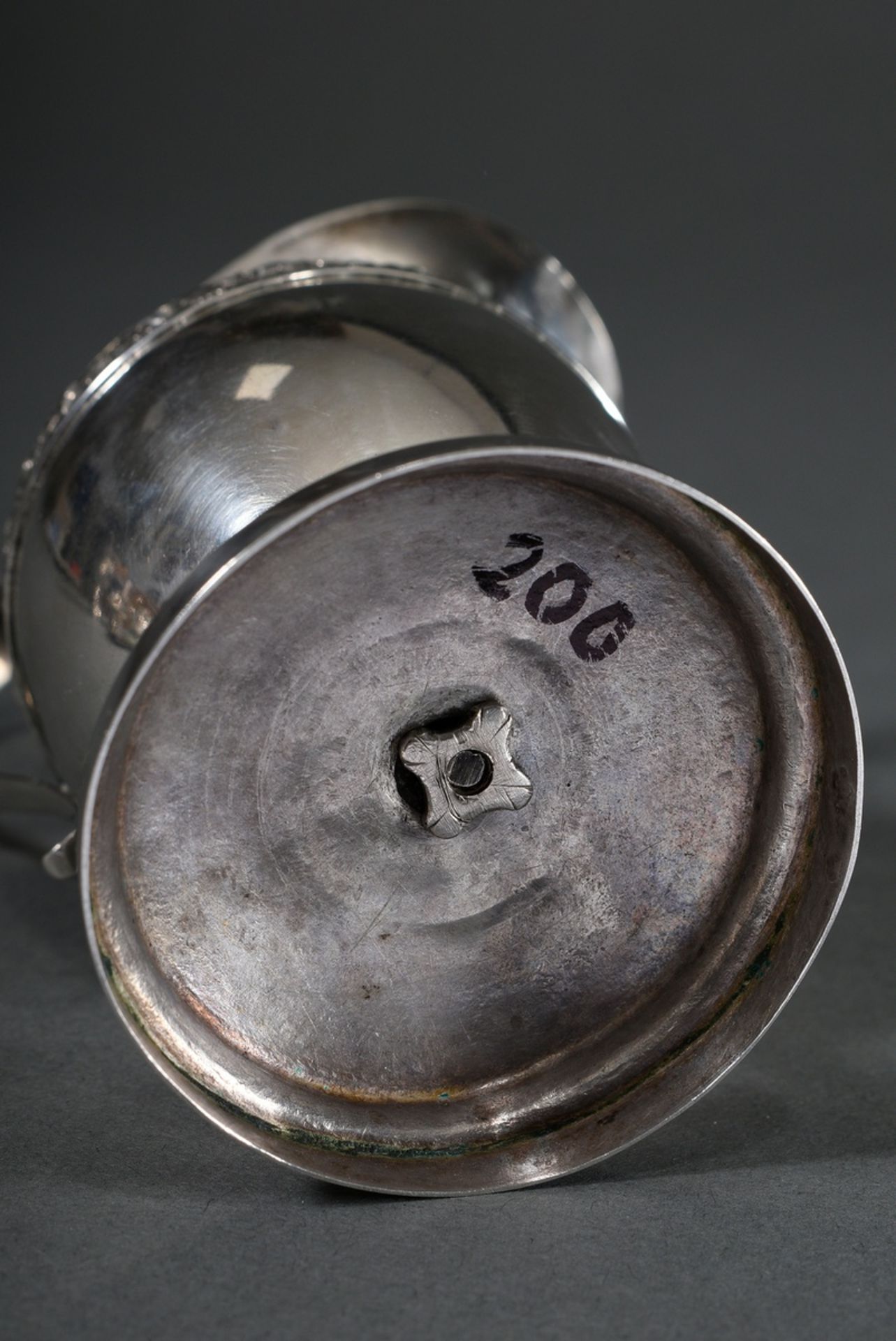 Cream pourer on a round foot with rose frieze in relief and raised handle with coat of arms in reli - Image 4 of 5