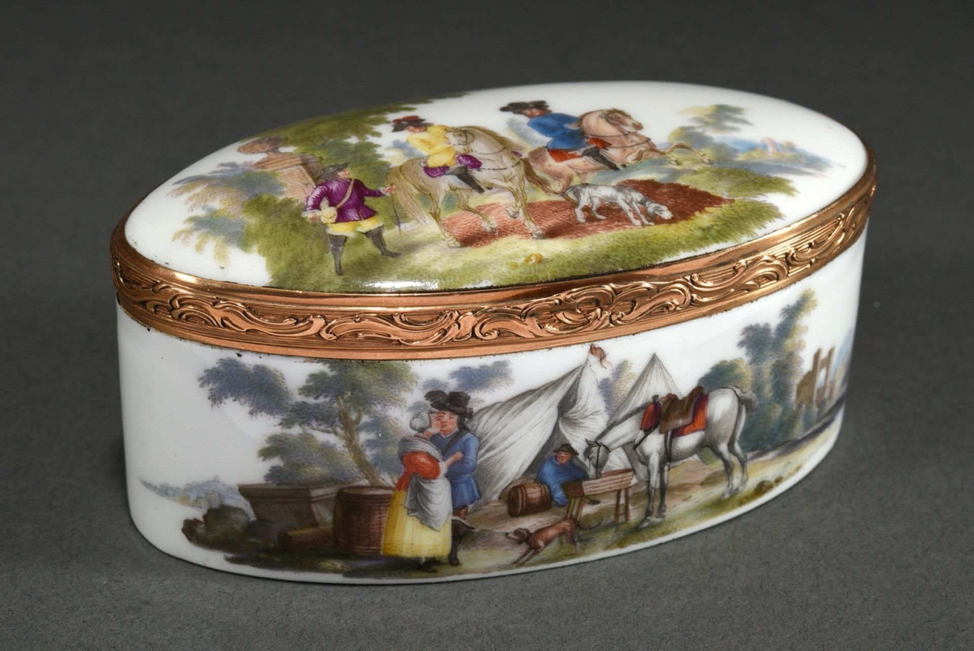 Oblong Höchst porcelain snuff box with floral engraved gold mount and delicate painting on the outs