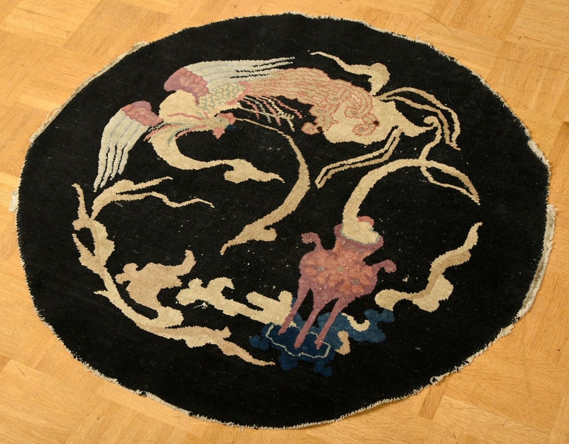 Medallion carpet "Phoenix and Incense Burner" on a dark background, fragment from a Peking carpet, 