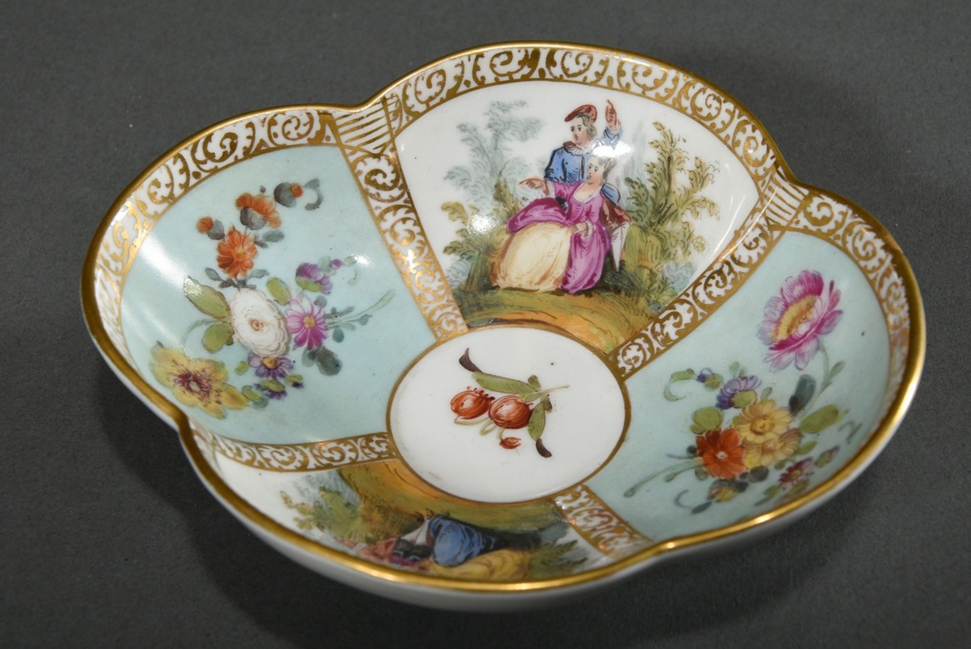 A four-piece porcelain cup/saucer with polychrome painting "Lovers" and "Blossoms" on a turquoise b - Image 4 of 8