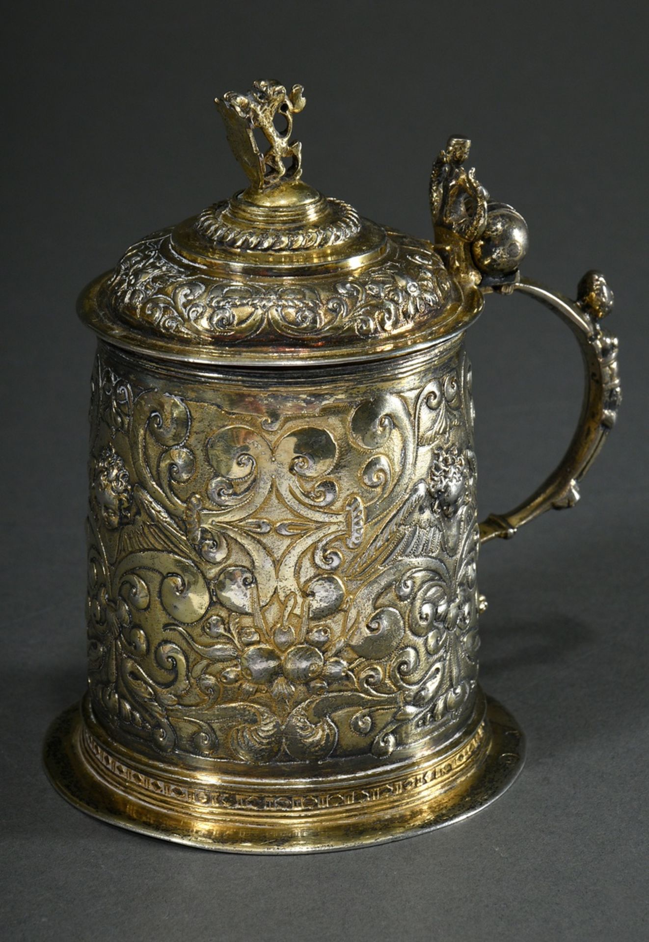 Small Mannerist lidded tankard with "fruit hangings and winged angels' heads" between scrollwork ov