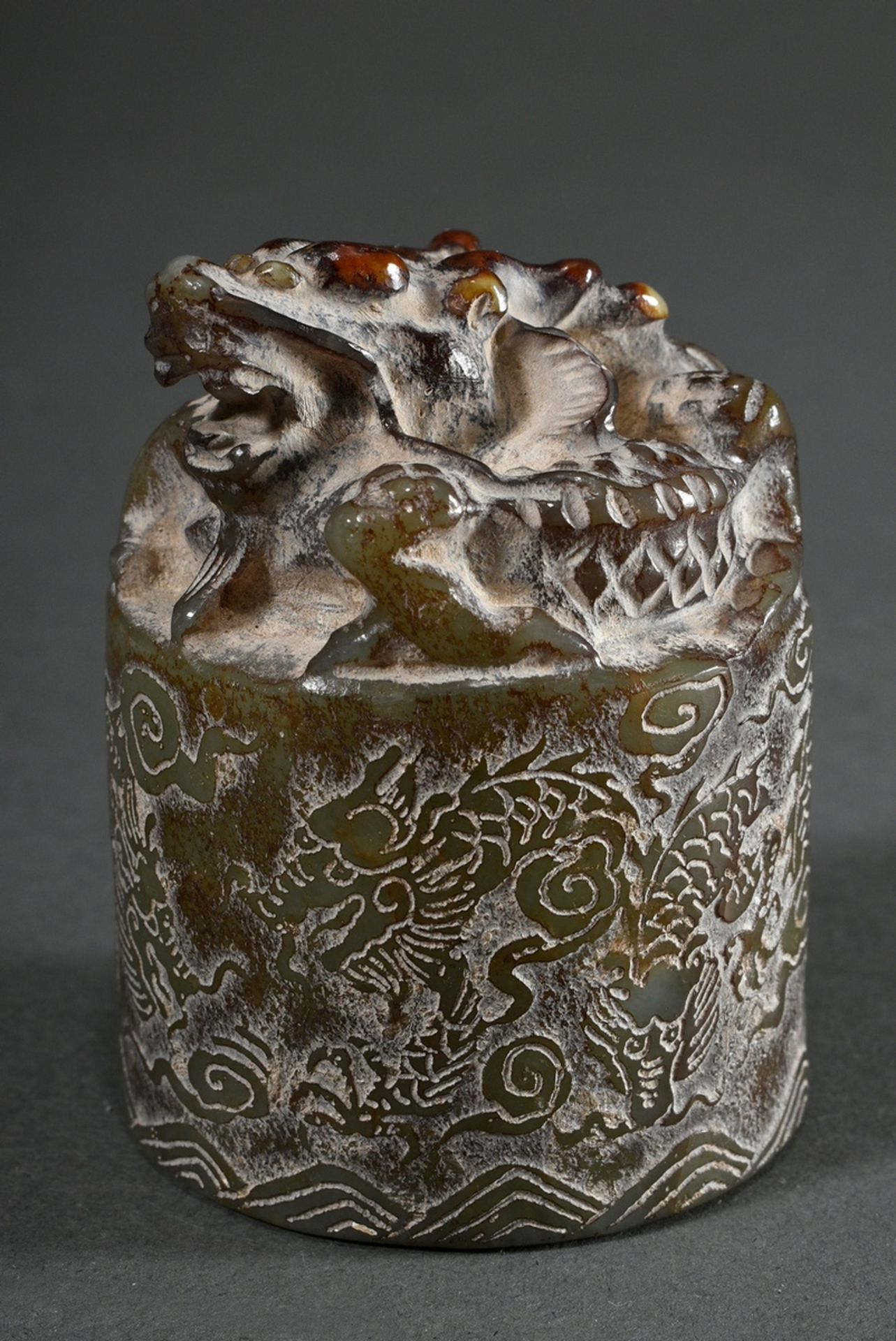 Jade seal in archaic style with sculpted dragon, all around finely raised cut "7 dragons in clouds 