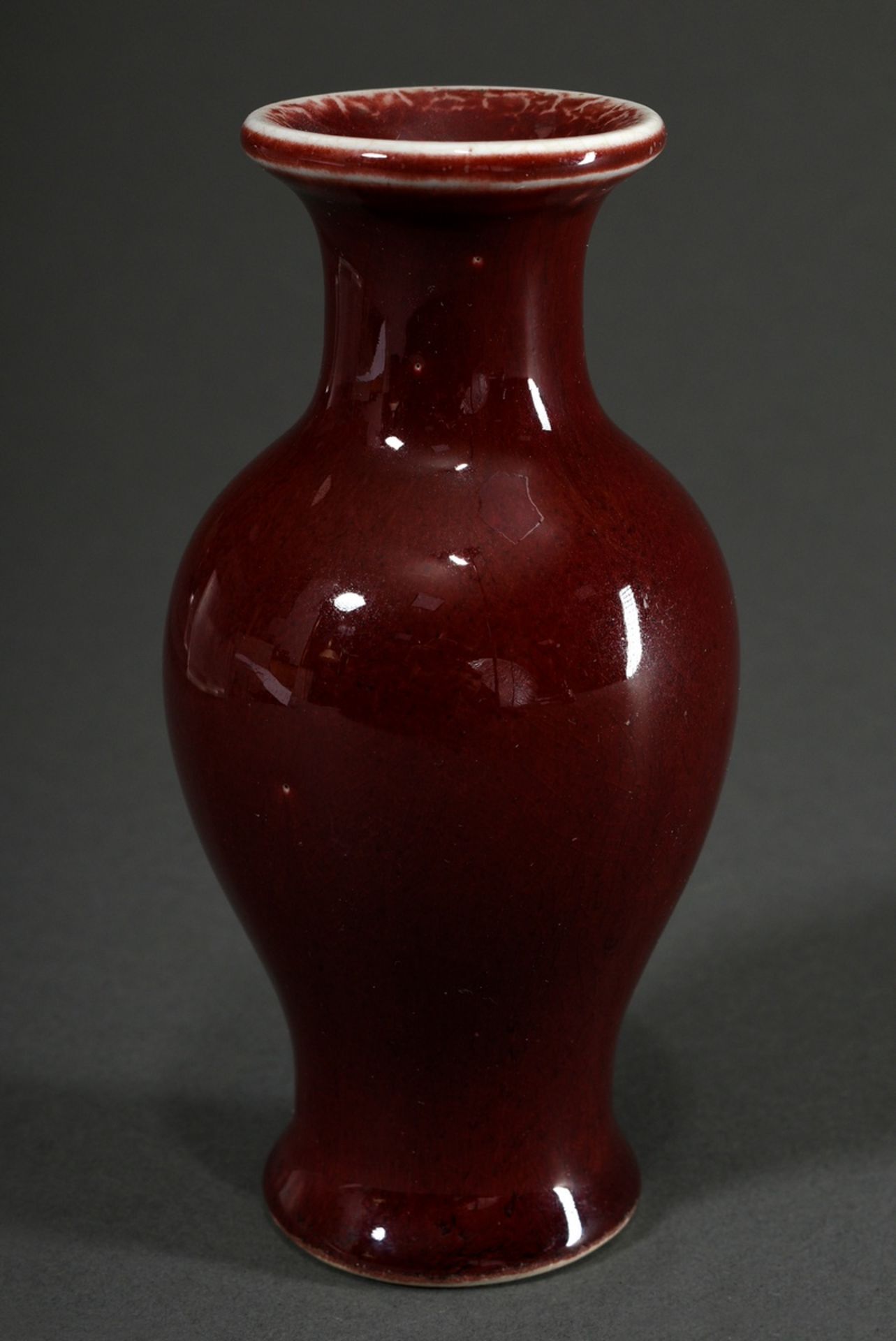 Small porcelain baluster vase in dark copper red "Jihong" with underglazed blue 4-character hall ma