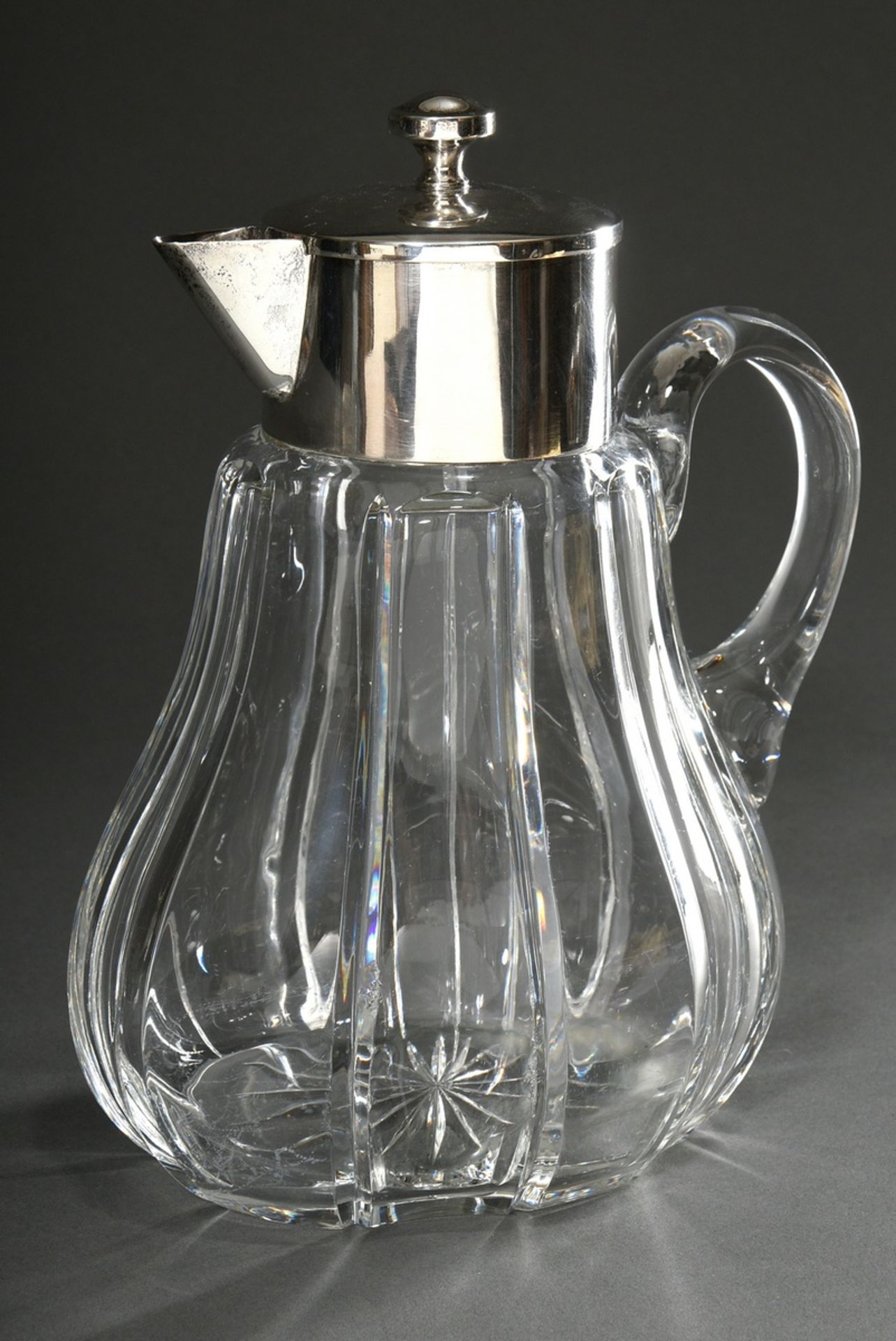 Bellied crystal jug with plain silver 800 mount and wide facet cut, 20th c., h. 27,5cm