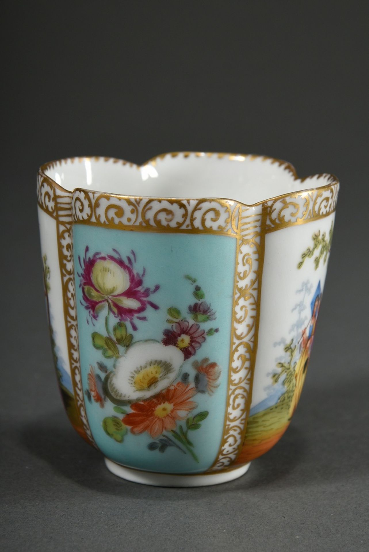 A four-piece porcelain cup/saucer with polychrome painting "Lovers" and "Blossoms" on a turquoise b - Image 6 of 8