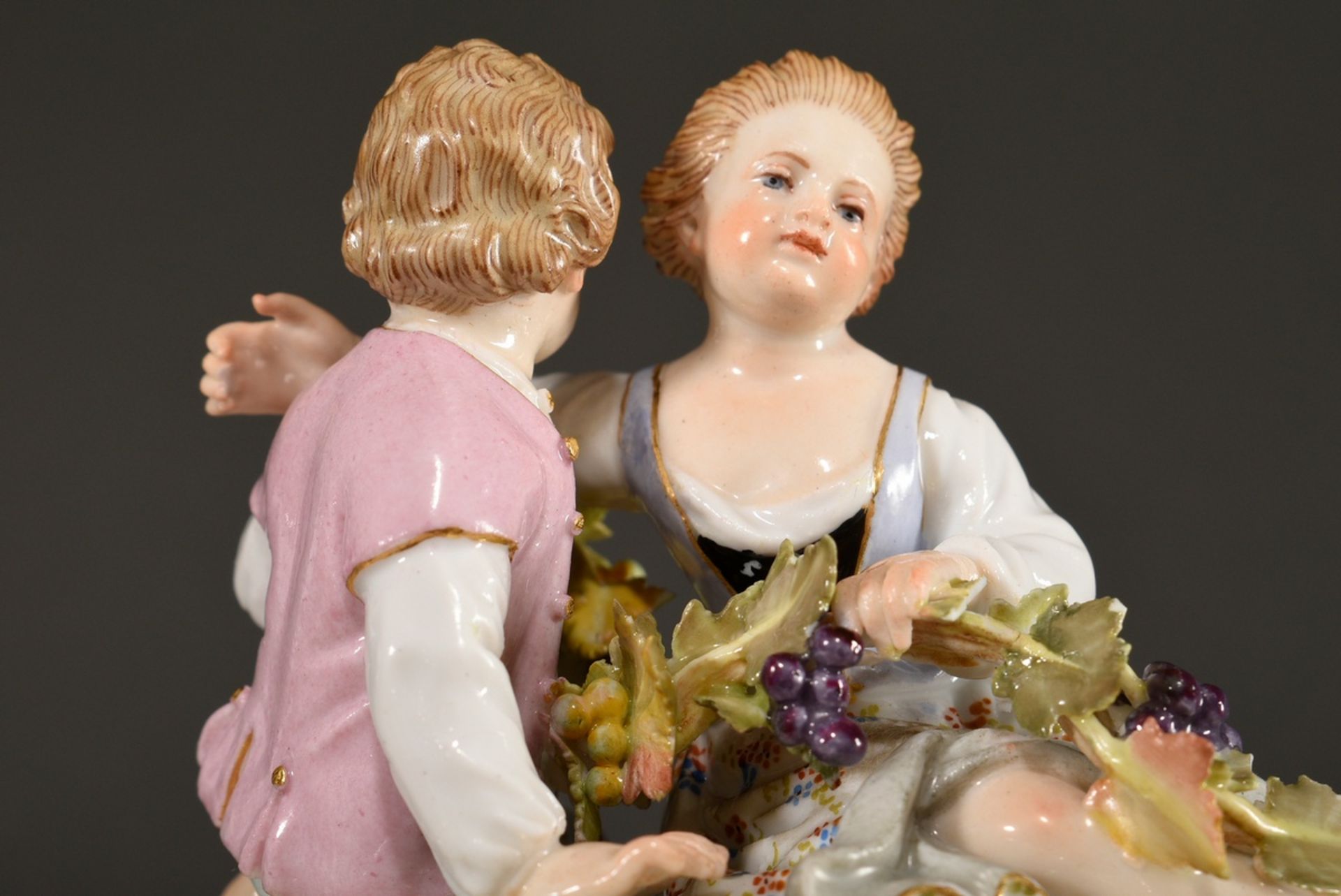 Small Meissen group "Two Children with Grapes", a boy and a girl sitting on an oval rocaille base f - Image 6 of 7