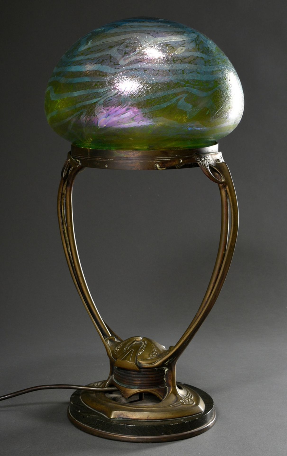 Art Nouveau table lamp on a vegetal yellow cast iron base with iridescent glass dome made by Otto T