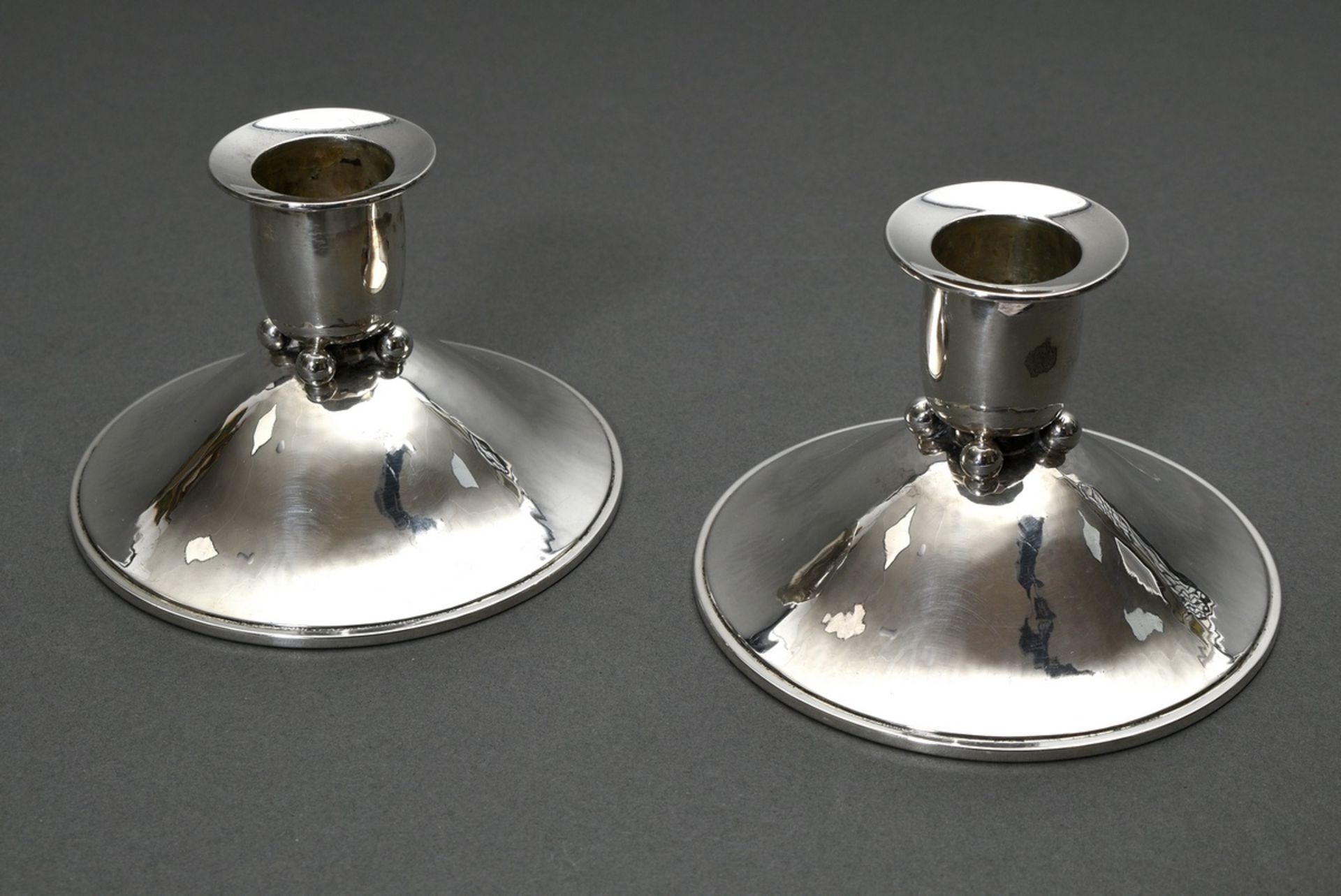 Pair of low Danish table candlesticks with ball details and martellated foot, MM: Hans Hansen, dat.