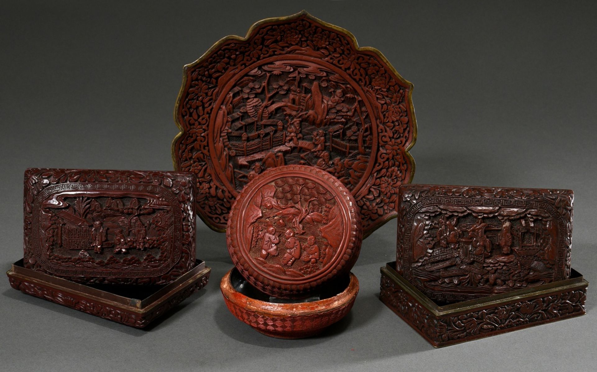 4 Various red carved lacquer objects: small round paper mache lidded box "Three playing children" (