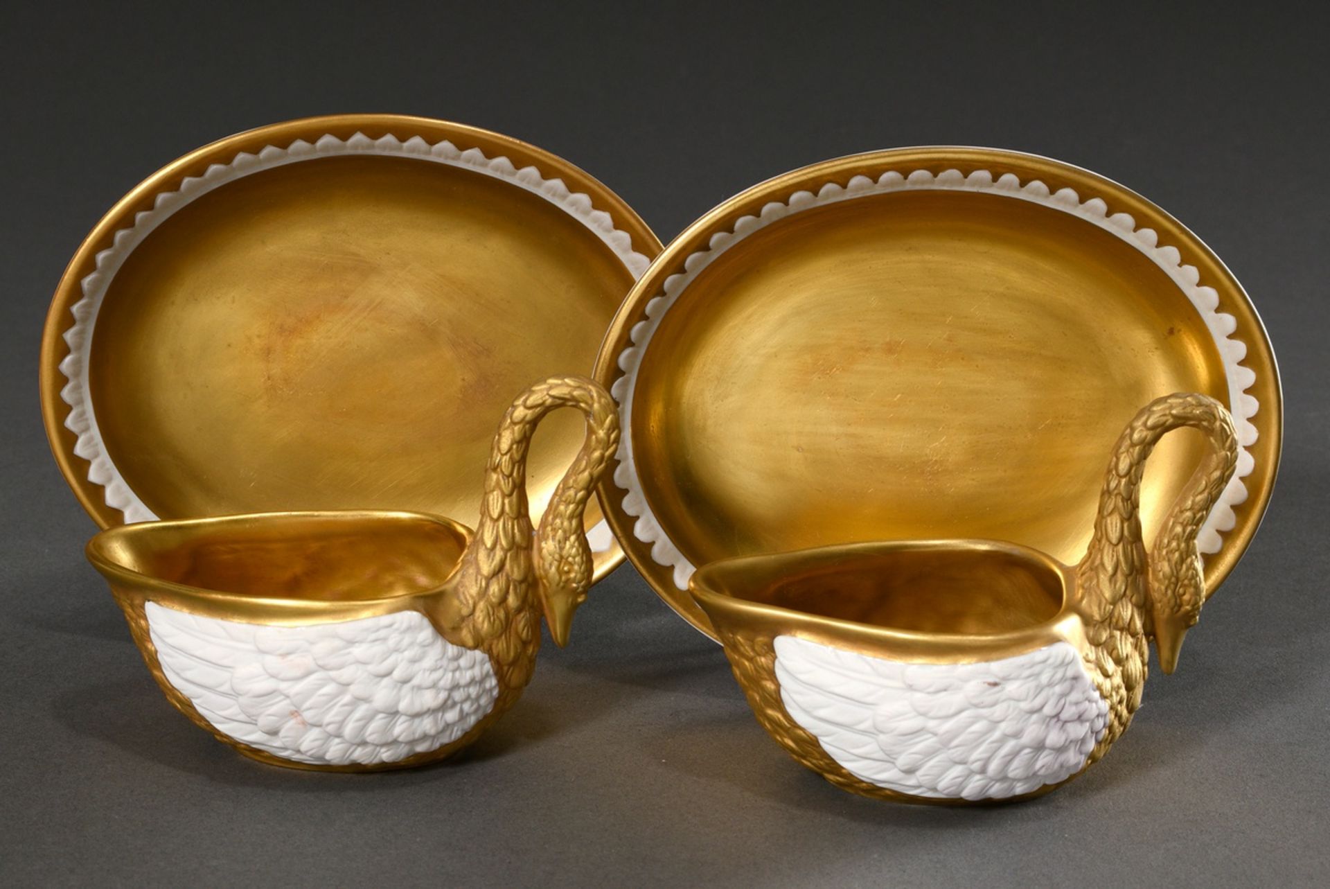 Pair of Dresden porcelain cups/UT "Swan" with rich gilding, molding no.: 6709, year: 1987/1988, bos