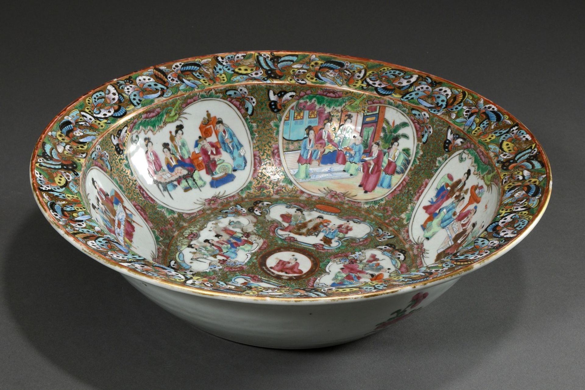 A very large Canton porcelain bowl with polychrome, partly opaque Famille Rose enamel painting, in 