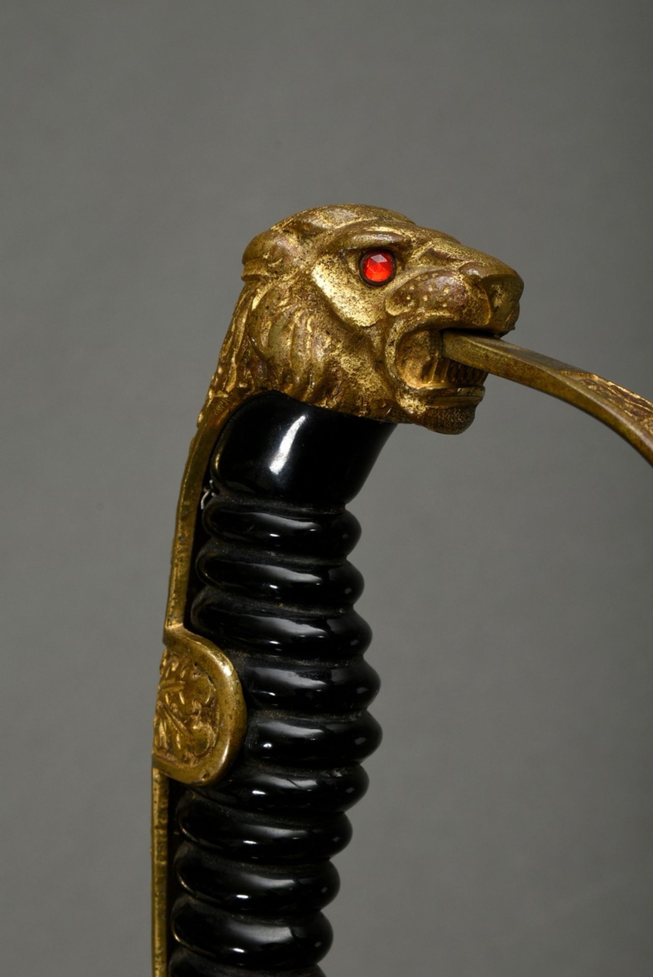 Wehrmacht officers lion head sabre with oak leaf decorations, bakkelite grip and red glass eyes, WK - Image 4 of 6