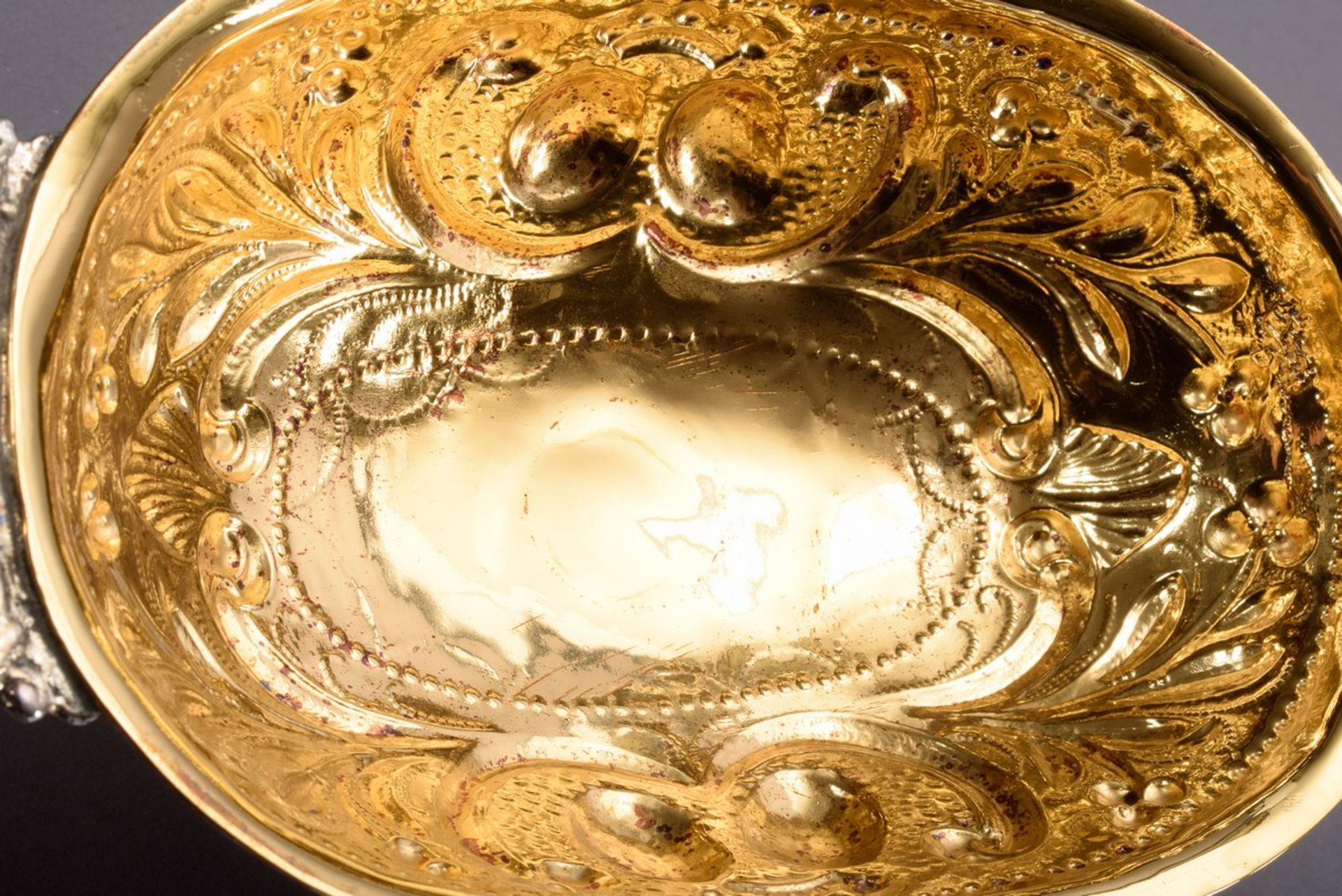 Oval brandy bowl with ornamental embossed wall and plastic handles with figural decoration, at the  - Image 3 of 4