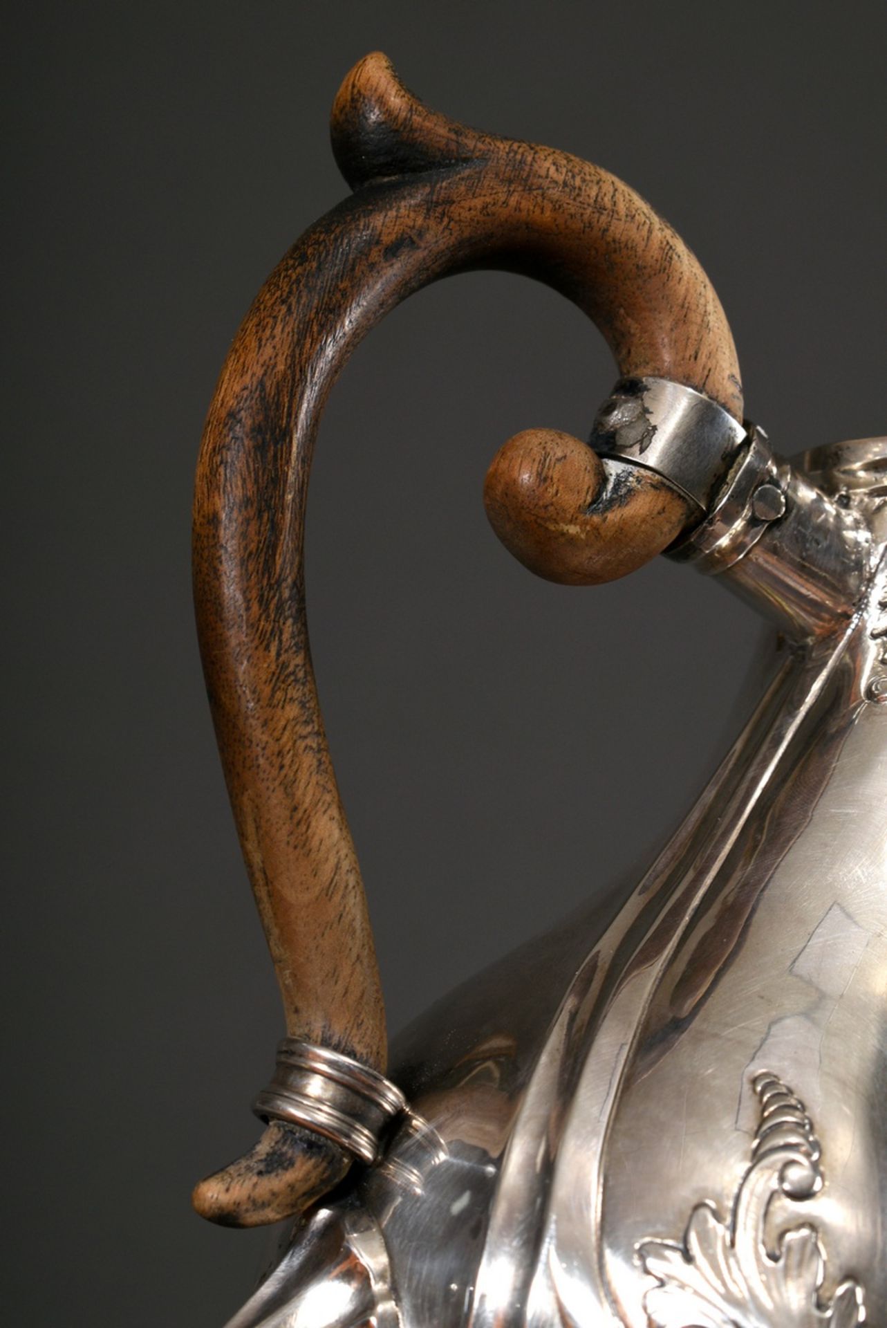 Elegant milk jug with curved wooden handle on paw feet with rocaille reliefs over curved features,  - Image 3 of 3