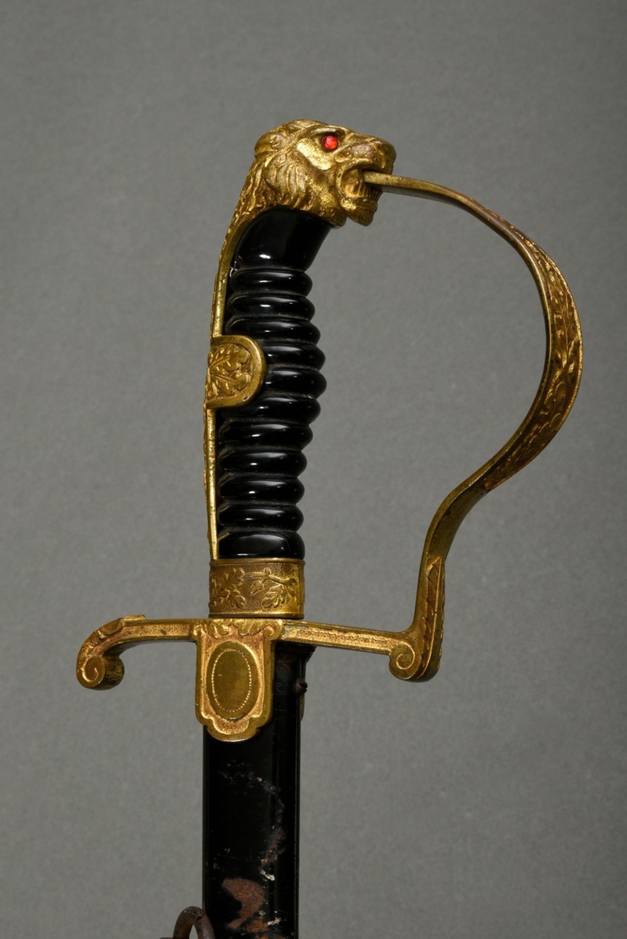 Wehrmacht officers lion head sabre with oak leaf decorations, bakkelite grip and red glass eyes, WK - Image 3 of 6