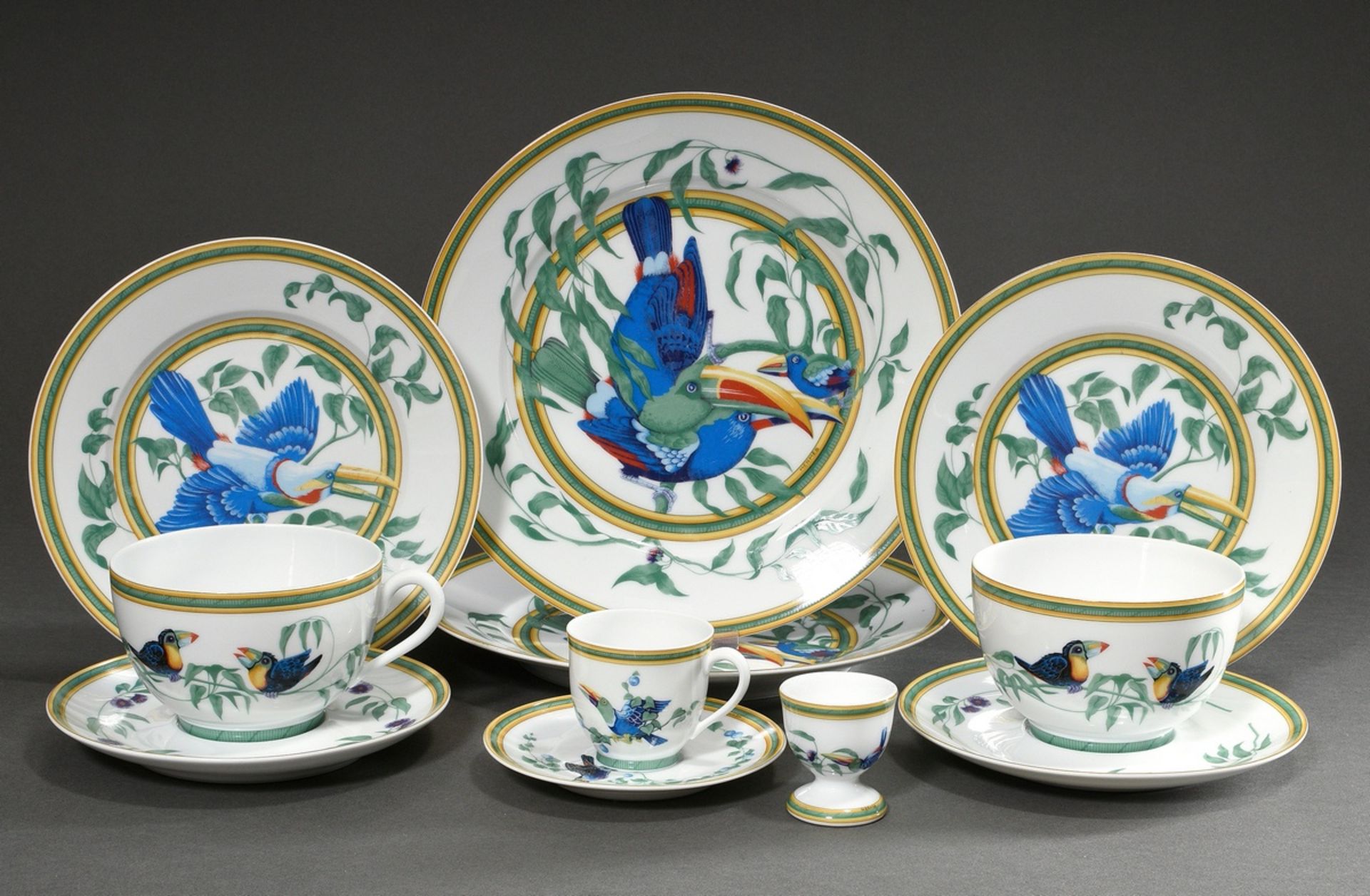 8 Pieces Hermès tableware "Toucans" consisting of: 2 big plates (Ø 27cm), 2 small plates (Ø 22cm), 