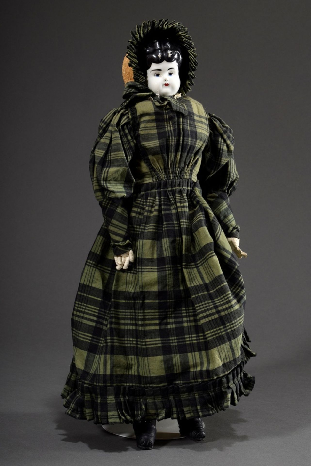 Biedermeier doll with painted porcelain chest head, blue eyes and closed mouth, leather body and or