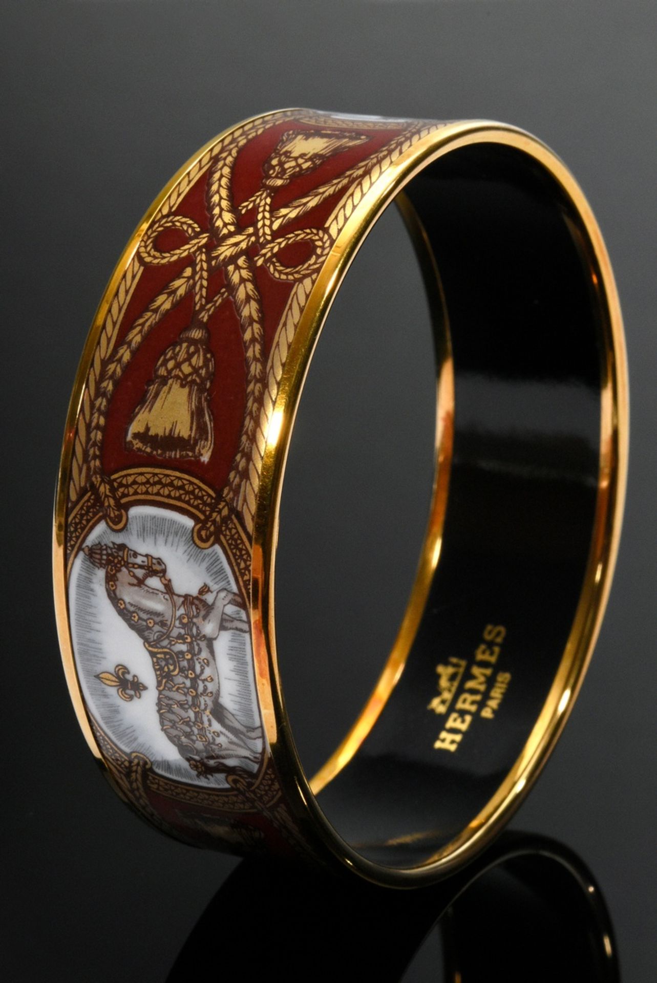 Wide Hermès bangle with brown and gold enamel print decoration "Schimmel und Quatenbänder", gilded 