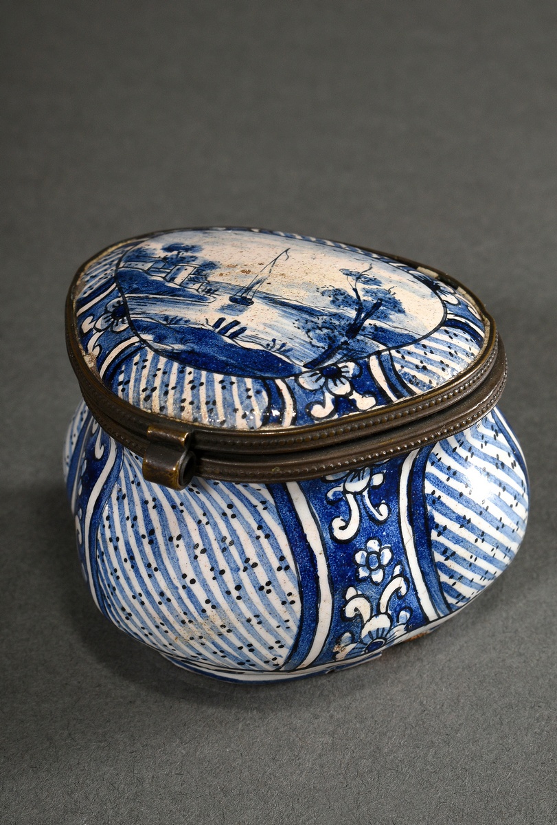 Small cambered Delft tabatiere with blue painting decoration "River Landscape", 18th/19th c., botto