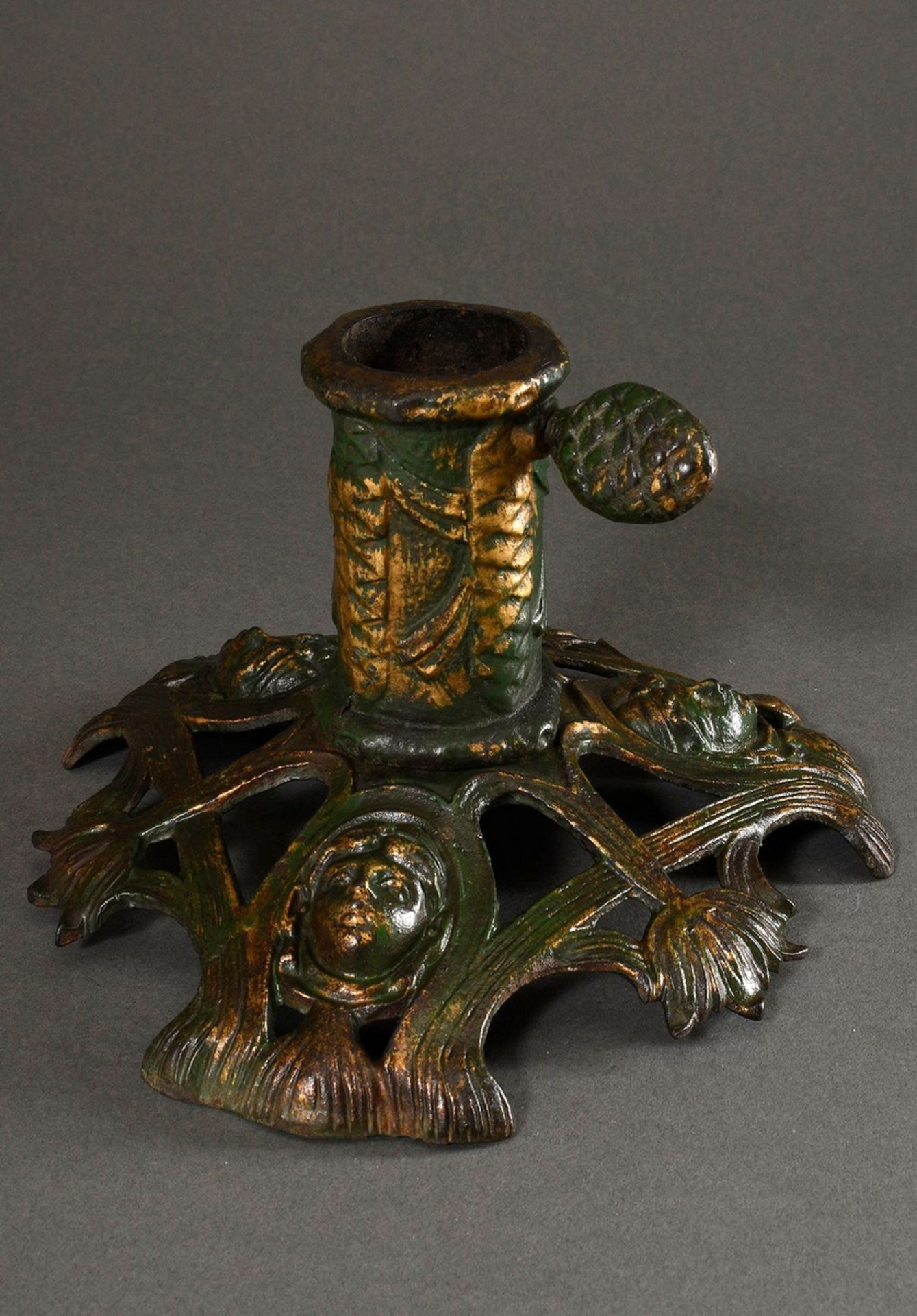 Art nouveau fir tree base with 3 female mascarons and adjusting screw in the shape of a cone, cast 