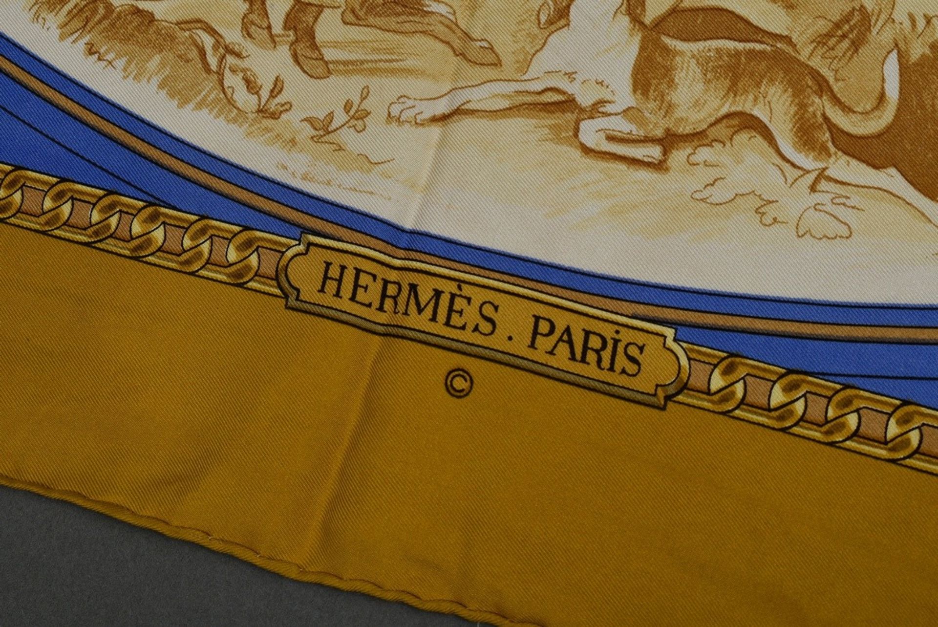 Hermès silk carré "Armes de Chasse" in ochre and blue, designed by Philippe Ledoux in 1970, rolled  - Image 2 of 3