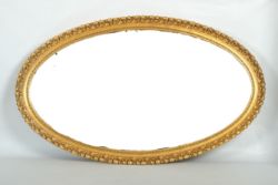 SPIEGEL, ovale Form mit vergoldetem Rahmen und Verzierungen, 20. Jahrhundert, 118x73cm