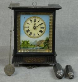 WANDUHR mit Landschaftsdarstellung, diese eingerahmt, mittig Uhr mit römischen Ziffern und schwarze