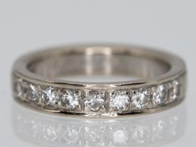 Memoryring mit 9 Brillanten, zusammen 0,51 ct (lt. Gravur), 90-er Jahre.