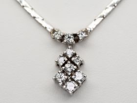 Collier mit 10 Brillanten, zusammen ca. 0,6 ct, 80-er Jahre.