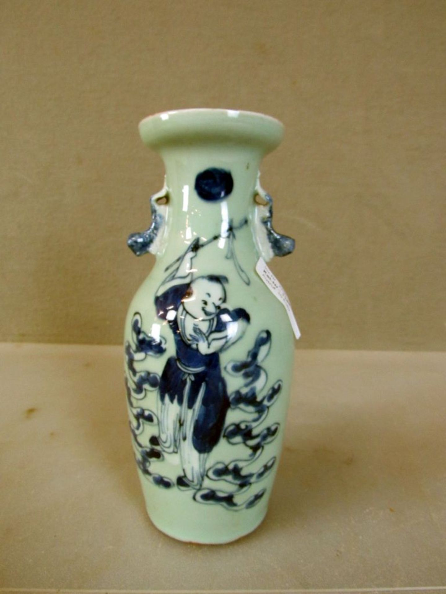 Asiatische Vase Handhaben in Fu-Hunden