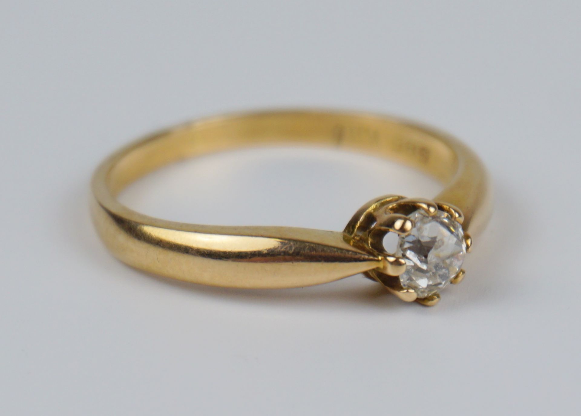 Ring mit Diamant in Krappenfassung, 585er Gold, Gew.3,46g - Bild 2 aus 2