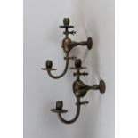 Paar Wandleuchter, 19 Jh., Bronze, Maße: H. 31,5 cm, T. 24 cm. Guter, altersbedingter Zustand.