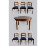 Ausziehtisch mit sechs Stühlen, England, um 1900, Tisch: Dm.: 120 cm, H.: 73 cm. Altersgemäß zufrie