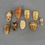 Konvolut Amulettanhänger in Form von Masken