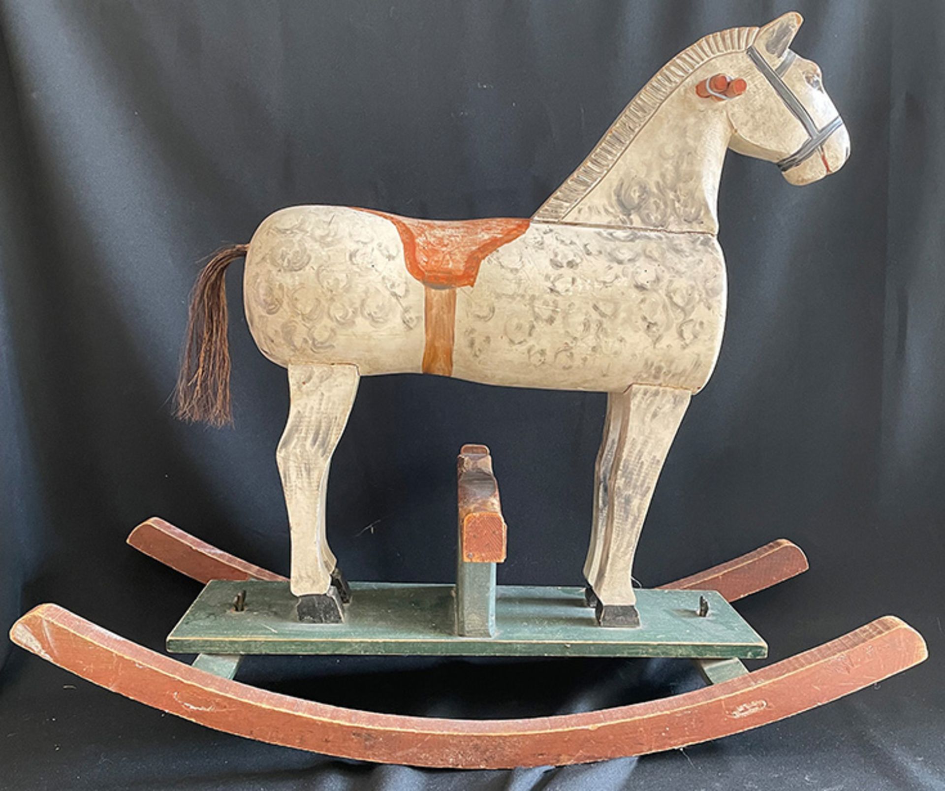 Schaukelpferd, Holz, bemalt, Schweif aus Rosshaar; Rocking horse, wood, painted, horsehair tail,