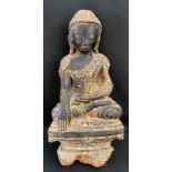 Buddha, Alter unbekannt, Holz, schwarz und golden gefasst, Altersspuren, teils besch., H. 40 cm. /